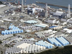 In this Sept. 2017, photo, tanks are seen at Fukushima Dai-ichi nuclear plant in Okuma.