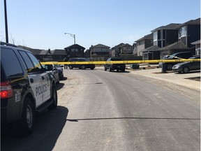 Police tape blocks off a section of 219 Street in Rosenthal on Saturday, April 28, 2018.