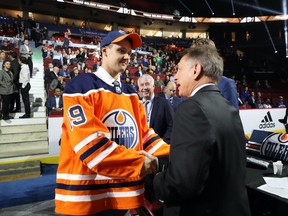 An actual goalie of the 1980s, 5'8 Ken Holland, welcomes 5'11 Ilya Konovalov to the Edmonton Oilers at the 2019 NHL Draft.