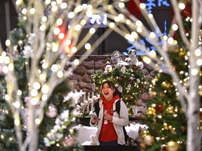 Kei Usui enjoys herself during the Festival of Trees for the first time at the Edmonton Convention Centre, a fundraising event for the University Hospital Foundation, on Nov. 28, 2019.