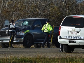 RCMP investigate after a pedestrian was fatality hit by a pickup truck travelling eastbound on Highway 16A about one kilometre west of Campsite Road near Spruce Grove on Wednesday, Oct. 7, 2020.