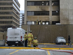 Multiple fire department units responsed to the scene of a fire on the second floor of the Petwin Tower at 10707 100 Ave. where traffic was shut down in all directions in Edmonton, October 21, 2020. Ed Kaiser/Postmedia