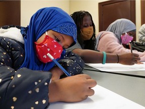 Children participate in an art class on Saturday October 24, 2020 at the Sinkunia Community Development Organization in Edmonton.