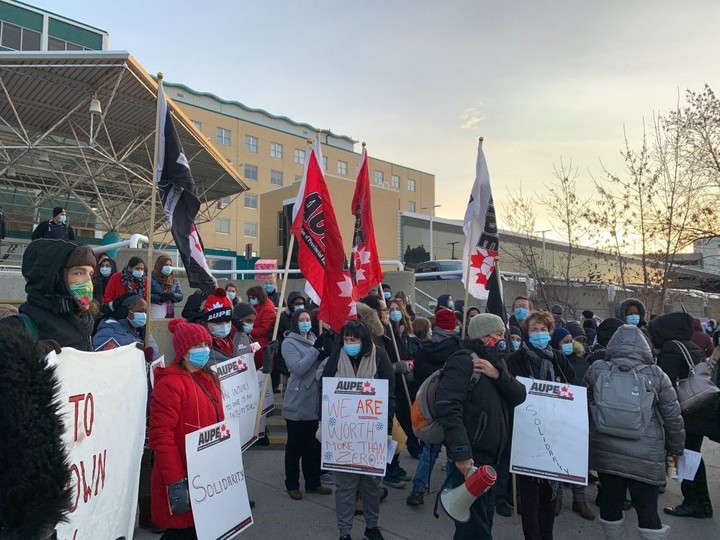  AUPE health-care workers walk off the job and picket outside the Royal Alexandra Hospital in Edmonton on Monday, Oct. 26, 2020.