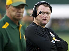 Edmonton's head coach Chris Jones watches the play during the pre-season at Commonwealth Stadium in this file photo from June 13, 2014.