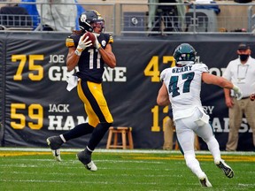 Chase Claypool #11 of the Pittsburgh Steelers catches a 35 yard touchdown pass in the second half against the Philadelphia Eagles on October 11, 2020, at Heinz Field in Pittsburgh.