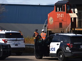 Police on the scene of a pedestrian fatality, hit by a train along 126 Ave. near the Yellowhead Tr. in Edmonton, October 15, 2020.