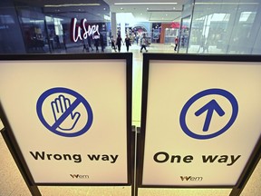 One-way is the only way as COVID-19 social distancing measures/signs at West Edmonton Mall are very noticeable to aid in reopening in Edmonton, June 22, 2020.