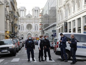 Security forces guard the area after a reported knife attack at Notre Dame church in Nice, France, October 29, 2020.