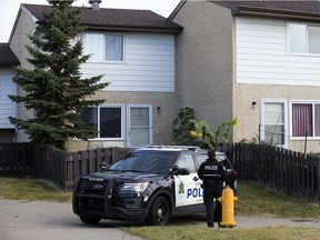 Police are investigating following the suspicious death of a man at the Lymburn townhouse complex near 180 Street and 74 Avenue, in Edmonton Sunday Oct. 11, 2020. Photo by David Bloom
