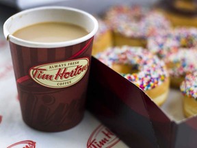 Tim Hortons will open drive-through outlets in every major city and town in the U.K. over the next two years, starting with Milton Keynes.