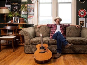 UPLOADED BY: Tom Murray ::: EMAIL: vendigoat@gmail.com ::: PHONE: 7806382594 ::: CREDIT: Michael Anderson Photography ::: CAPTION: Mike Plume puts down the guitar for the pen with his first children's book, More Than a Game, out Dec. 1 on Bandcamp.