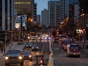 Jasper Avenue is seen from 111 Street in Edmonton, on Wednesday, Nov. 4, 2020. Edmonton City Council has voted to reduce speed limits in high pedestrian areas to 40 km/hr. The reduction comes into effect next summer. Photo by Ian Kucerak/Postmedia
