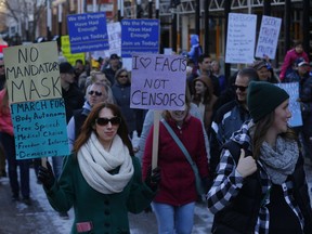 Hundreds of anti-mask protestors came out for the Walk for Freedom march at City Hall in Calgary on Saturday, November 21, 2020.