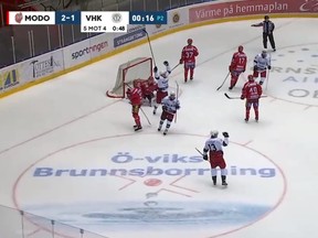 Raphael Lavoie (#13 white) celebrates his second goal of the game.