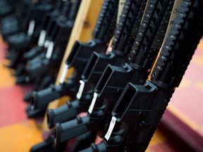 Rifles  or sale at a gun shop in Merrimack, New Hampshire. File photo.