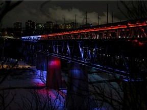 Edmonton's High Level Bridge is lit in red and white in honour of the victims of Ukraine International Airlines Flight PS752, on Jan. 8, 2020. Lawyers representing the City of Edmonton argued the city decided not to light a local bridge in colours that would represent the cause of an anti-abortion group in Alberta because the issue risked polarizing the region, an Edmonton judge heard Friday.