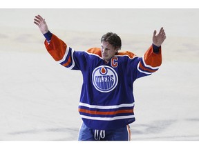Edmonton forward Ryan Smyth (94) waves to the crowd after his last game as an Edmonton Oiler at the end of an NHL game between the Edmonton Oilers and the Vancouver Canucks at Rexall Place on April 12, 2013.
