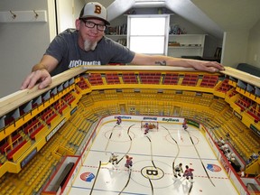 Trent Buhler makes accurate table top hockey games of legendary NHL arenas at his home in Edmonton.