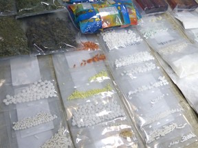 ALERT Edmonton’s organized crime and gang team seized $200,000 worth of drugs and cash on Dec. 9, 2020.