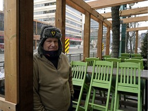 Wayne Jones, owner of the Rocky Mountain Icehouse on Jasper Avenue in downtown Edmonton, on the empty outdoor pub patio on Monday December 14, 2020. The Alberta government has imposed new COVID-19 restrictions in the province that has forced the closure of all bars and pubs for at least four weeks, effective Sunday December 13, 2020.