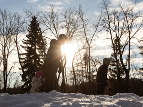 Skaters take to theVictoria Park IceWay in Edmonton, on Thursday, Dec. 24, 2020. The IceWay allows skating in the trees in a picturesque part of the river valley.