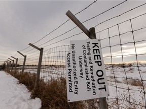 The former Domtar site is seen fenced off due to industrial contamination along Hermitage Road in northeast Edmonton, on Saturday, Dec. 5, 2020.