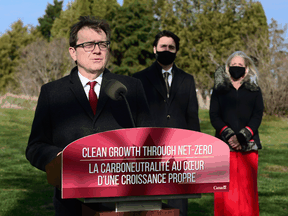 Environment and Climate Change Minister Jonathan Wilkinson speaks as Prime Minister Justin Trudeau and Infrastructure and Communities Minister Catherine McKenna hold a press conference in Ottawa on Thursday, Nov. 19, 2020, on a climate change plan.