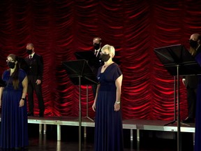 The masked members of Edmonton's professional choir, Pro Coro, singing live for the choir's online TV channel.

Pro Coro celebrate their 40th anniversary this Saturday with a special live on-line event featuring choir members and artistic directors past and present.