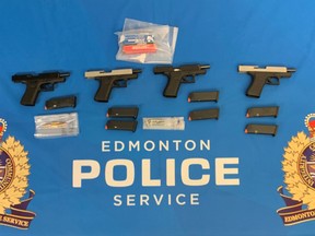 Four Glock 48 handguns purchased through straw-buying seized by Edmonton police in recent investigation into firearms trafficking.