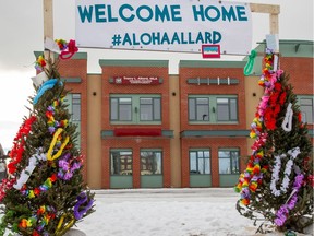 An #AlohaAllard sign and Hawaiian-decorated trees sit outside of Alberta Municipal Affairs Minister Tracy Allard's constituency office in Grande Prairie on Sunday, Jan. 3, 2021.