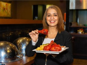 Monika Lavelle, owner of the Sherwood Park New Asian Village, thought at first creating Tandoori Fried Chicken (TFC) was "a bit of a joke." But customers loved it and she went on with her chefs to create many more popular Indian-Canadian fusian dishes.