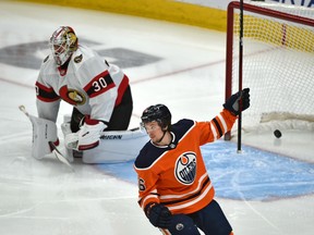 Edmonton Oilers forward Kailer Yamamoto (56) celebrates Dominik Kahun's (21) goal on Ottawa Senators goalie Matt Murray (30) at Rogers Place in Edmonton on Sunday, Jan. 31, 2021.