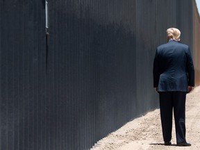President Donald Trump marks construction of the 200th mile of the border wall in San Luis, Arizona, June 23, 2020.