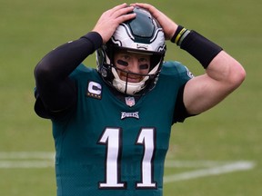 Philadelphia Eagles quarterback Carson Wentz reacts after throwing an incomplete pass against the Cincinnati Bengals on Sept. 27, 2020.