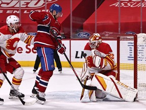 Calgary Flames goaltender Jacob Markstrom makes a save against the Montreal Canadiens’ Tomas Tatar at the Bell Centre on Saturday, Jan. 30, 2021.