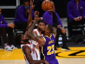 Los Angeles Lakers forward LeBron James moves to the basket against Chicago Bulls forward Patrick Williams during the second half at Staples Center on Jan. 8, 2021.
