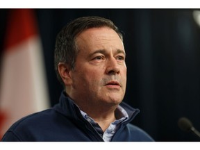 Premier Jason Kenney gives an update on the government's COVID-19 response including further finanical assistance for businesses and families affected by the pandemic at the Alberta Legislature in Edmonton, on Monday, March 23, 2020. Photo by Ian Kucerak/Postmedia