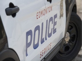 File: The side of a rain soaked Edmonton Police Service vehicle on Oct. 19, 2015.