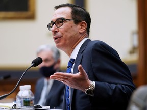 Treasury Secretary Steven Mnuchin answers a question during a House Financial Services Committee hearing on "Oversight of the Treasury Department's and Federal Reserve's Pandemic Response" in the Rayburn House Office Building in Washington, U.S., December 2, 2020.