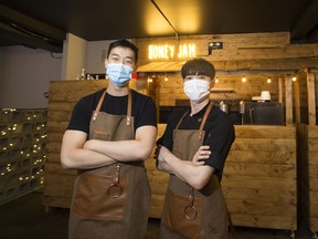 Sam Lee (left) and Jacob Kim,(right) co-owners of Honey Jam, a new kind of pop up in the Hanjan restaurant space on Wednesday, Feb. 3, 2021 in Edmonton