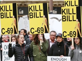 Pro-pipeline supporters rally against Bill C-69, in Calgary on March 25, 2019.