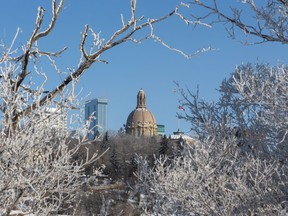 The Alberta Legislature is seen from Kinsmen Park as the temperature hovers around -27 degrees Celsius in Edmonton, on Monday, Feb. 8, 2021.