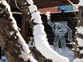 An ice sculpture dances a jig on the winter patio at Woodrack Cafe in Edmonton on Saturday, Feb. 13, 2021. Boardwalk Ice on Whyte is adding sculptures to winter patios around YEG in February.