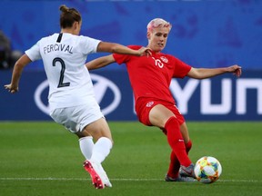 Canada's Sophie Schmidt in action with New Zealand's Ria at the Percival Stade des Alpes, Grenoble, France on June 15, 2019.