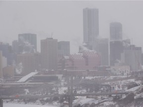 A light snowfall obscure the city skyline  on Friday,Feb. 5, 2021 in Edmonton.