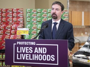Labour and Immigration Minister Jason Copping announces Alberta's plan to recognize hundreds of thousands of critical workers who continue to support and provide services to Albertans during this pandemic at a news conference from Belmont Sobeys in northeast Edmonton on Feb. 10, 2021.