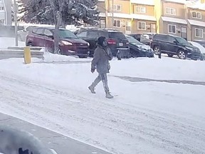 Edmonton police are looking for a male homicide suspect seen in a parking lot of a townhouse complex near 139 Avenue and 35 Street on Feb. 17, 2021 around 8:30 a.m.