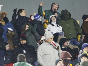 Bryan Hall leads the fans in the Edmonton Football Team's fight song at Commonwealth Stadium on Nov. 2, 2012.