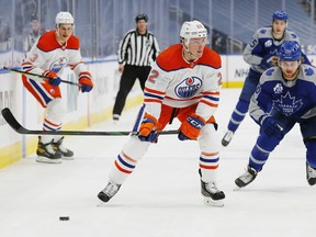Edmonton Oilers defencemen Tyson Barrie (22) looks to make a pass in front of Toronto Maple Leafs forward William Nylander (88) at Rogers Place in this file photo from Jan 30, 2021.